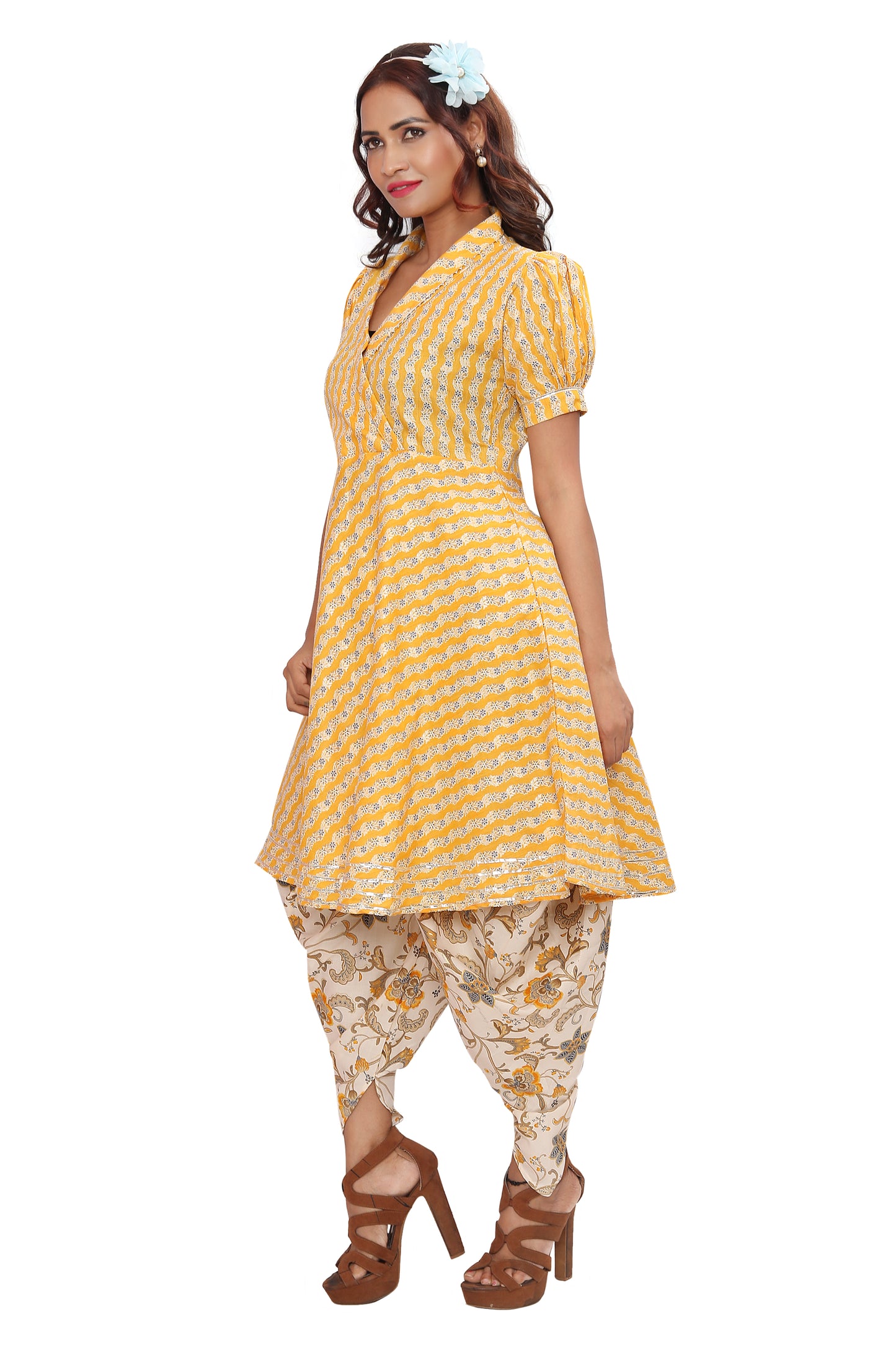 Get ready to turn heads in our stylish and comfortable rayon Kurti and Dhoti set!