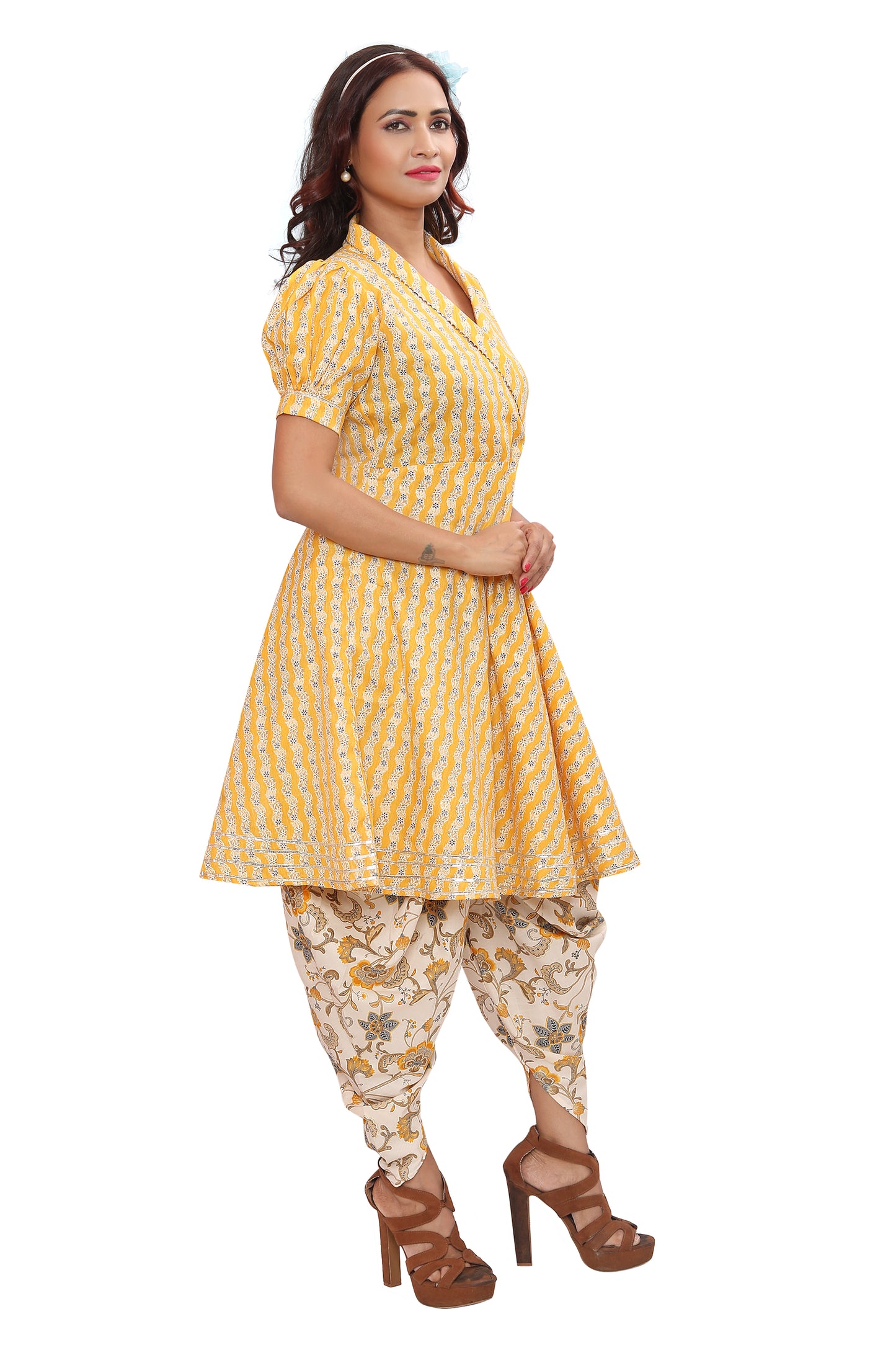 Get ready to turn heads in our stylish and comfortable rayon Kurti and Dhoti set!